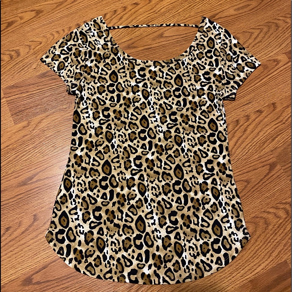 Leopard print short sleeve ladies top. Size small.